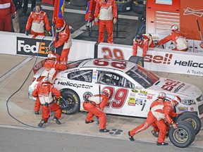 Thanks to taking four fresh tires late in the race, Kevin Harvick was able to jump ahead seven spots to win the Toyota Owners 400 on Saturday. (GETTY IMAGES)