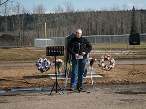 Peter Janson, senior vice president of CNRL’s Horizons Operation, speaks at Sunday’s National Day of Mourning. The crutches are from a hunting accident. Patricia Reid/Supplied photo