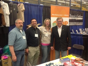 Edmonton-Calder MLA David Eggen, far right, stands with party volunteers at the Spring Trade Show on Saturday. Eggen says many residents are angry over new taxes in the region. SUPPLIED PHOTO