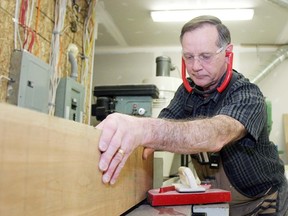 Marty Schlosser shapes raw wood into finished works of art in his west-end workshop. He encourages anyone interested in workworking to join the Kingston Woodworkers Association.     ROB MOOY - KINGSTON THIS WEEK
