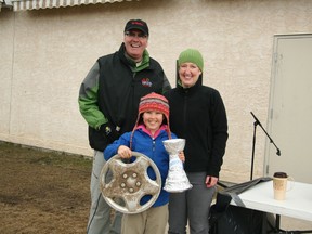 Five teams and over 30 volunteers took part in the first annual Trash Bash on Sunday, Apr. 21, traversing Devon to pick up as much garbage as possible.
Prizes were given out to participants by the Community Centre afterwards. At left, Jemma Kagume won for the largest item for finding an old hubcap. The Spratt family won the award for most expensive item after finding an iPod near Riverview Middle School. The family said they’d be returning the item to the school in case it belongs to a student.