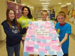 Students from Winchester Street Public School have raised just over $1,300 for  Free the Children through the We Are Silent campaign and T-shirt sales for the All's Fair 110 Hour Wear-athon. From left Abby Langille, Calista Sinclair, Kristjan Ossenkopp and Dustin Chowen. (HEATHER RIVERS/WOODSTOCK SENTINEL-REVIEW)