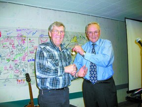 Ralph Eichhorn, left, a dedicated community volunteer, is presented the Queen Elizabeth Diamond Jubilee Medal by Coun. Dwight Davidson of Lac Ste. Anne County.