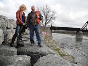Tracey Bucci, president of the Grand River Environmental Group, and Roger Chandler, owner of Blue Heron Rafting, are putting out the call for volunteers to join the 12th annual Grand River Environmental Festival cleanup on May 11. (MICHAEL-ALLAN MARION, The Expositor)