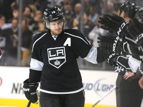 Mike Richards of the Los Angeles Kings celebrates with his bench after scoring the Kings’ second goal in the first period against the Colorado Avalanche at the Staples Center in Los Angeles on April 11, 2013. The Kings open defence of their 2012 Stanley Cup against the St. Louis Blues on Tuesday, April 30.
FILE PHOTO/AFP