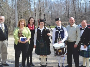 The Bruce County Historical Society held a book launch on April 27 at the Point Clark Community Centre for their publication, “Historical Plaques and Cairns of Bruce County”. From left to right are Bill Stewart (editor), Huron-Bruce MPP Lisa Thompson, Kathleen Scott (cover artist), Jennifer Farrell (Kincardine Scottish Pipe Band), Zack Miller (78th Fraser Highlanders), Huron-Kinloss Mayor Mitch Twolan and Ross Lamont (president of the Bruce County Historical Society).