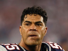 New England Patriots linebacker Junior Seau looks on before the start of the NFL's Super Bowl XLII football game against the New York Giants in Glendale, Arizona in this February 3, 2008 file photograph. (REUTERS/Mike Blake/Files)
