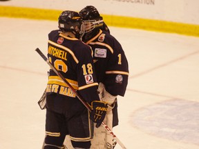 Forward Matthew Mitchell and goalie Jacob Kment share a few words following Soo North Stars fifth-and-final game at last week’s Telus Cup, national AAA midget championships that were held at the Essar Centre in Sault Ste. Marie. The North Stars finished with a 2-2-1 record at the Telus tournament.
