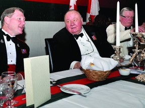 Lt. Col Shawn Herron, left, commanding officer of the Brockville Rifles, shares a laugh with Lt. Col. Roman Jarymowyzc, the guest of honour at the Rifles' 147th annual regimental dinner on Saturday night at the Brockville Armouries. (RONALD ZAJAC/The Recorder and Times)