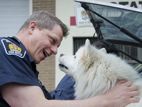 Firefighter Claude Duval is greeted by Inge for the first time since the rescue.
Julia McKay For The Whig-Standard