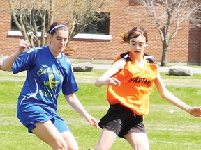 Krista Chaddock of Char-Lan and Terran Hall of Seaway fight for the ball during their senior girls contest in Williamstown on Tuesday. Char-Lan won the game 1-0.
Erika Glasberg photo