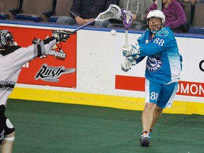 Rochester forward Cody Jamieson of Six Nations (left) — seen here during a game against Edmonton — and the Knighthawks defeated Philadelphia 10-8 on the weekend to advance to the National Lacrosse League East Division finals. (IAN KUCERAK QMI Agency)