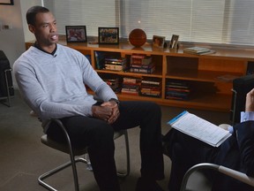 NBA basketball player Jason Collins (L), the first openly gay active athlete on a major U.S. professional sports team, sits for an interview with ABC News. (REUTERS)