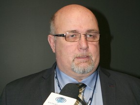 Dave McFadden, president of the Police Association of Ontario, speaks at a press conference held at the Bradley Convention Centre.