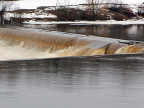 Water flowing over the Sandy Falls dam on the Mattagami River in Timmins
