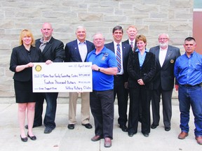 Ottawa Valley Rotary Clubs from Petawawa, Eganville, Renfrew and Arnprior collectively donated $14,000 to help kick start the Renfrew County Crisis Support Clinic for Youth and Families, which will help provide intervention support for youth and their families during times of personal crisis. In the photo, Monique Yashinskie, far left, administrator of the Robbie Dean Family Counselling Centre, and Tom Sidney, crisis centre supervisor, accept the cheque symbolizing the donation from Rotary Club representatives Bob French, Ray Serre, John Wilson, Dave Clarke, Kathy Loftus, Norm Edwards and Joe Fontes.