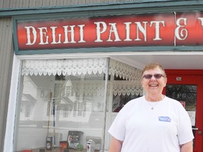 Bev Heath, owner of Delhi Paint, stands in front of the store, which is being recognized with a lifetime achievement award by the Delhi and District Chamber of Commerce. (SARAH DOKTOR Delhi News-Record)