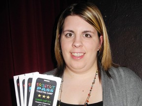 Registration for the Backstage Pass Summer Camp at the Backstage Capitol Theatre is now open. Rebecca Livingstone, camp instructor, holds up pamphlets for this year's camp. (SARAH DOKTOR Delhi News-Record)