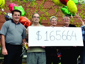 Operation Harvest Sharing board members celebrate the end of their Growing Bigger To Give Better Campaign, which raised $25,664 more than its goal. From left is board member Michael Hurley, food bank treasurer Ken Lacey, board members Joanne Sytsma and Myra Garvin and capital campaign chairwoman Catherine Deplaedt. (ALANAH DUFFY/The Recorder and Times)