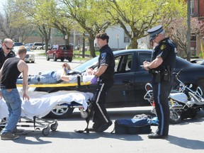A Dodge car and a silver ebike collided in downtown Simcoe over the lunch hour on Wednesday. The crash occurred at the corner of Talbot Street and Robinson Street south of Talbot Gardens. Norfolk paramedics tended to David LaSalle, 24, of Simcoe, who was on the ebike at the time of the mishap. There has been no report yet about the extent of his injuries or whether charges will be laid. (MONTE SONNENBERG Simcoe Reformer)