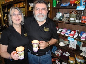 Owners Linda and Ray Munroe stand inside the Pastime Emporium, a gift store and cafe located on Main Street in Delhi. The store is being recognized with the Business Improvement Award for a small business by the Delhi and District Chamber of Commerce. (SARAH DOKTOR Delhi News-Record)