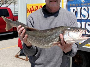 Gerry Fawdry holds a 7.66 pound Lake Trout that he caught during the Bluewater Angler's annual Salmon Derby. BLAIR TATE/FOR THE OBSERVER/QMI AGENCY.