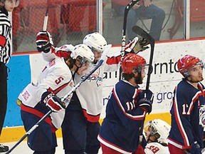 Members of the Summerside Western Capitals celebrate what would turn out to be the only goal of the game, as the Cornwall Colts dropped a 1-0 decision in their Fred Page Cup opener.
Fred Page Cup photo