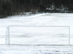 The fields at the Lake of the Woods Soccer Association’s Tom Nabb Park sit under snow and puddles of water from Tuesday night’s snowfall.