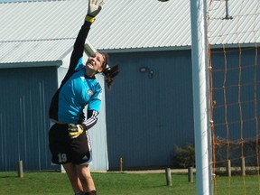 Paris Panthers goalkeeper Courtney Boehmer can't get her hand on a Jerika Baldin free kick Wednesday against the assumption College Lions during girls high school soccer action. (DARRYL G. SMART Brantford Expositor)