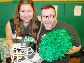 SARAH DOKTOR Simcoe Reformer
Former Port Dover Composite School student Justine Shortt and teacher Jason Mayo were among the volunteers selling surplus yearbooks, jerseys and equipment at a yard sale at the school on Wednesday.