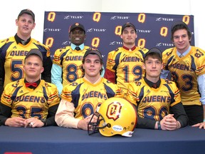 Queen’s Golden Gaels football team introduced seven new recruits at the Athletics and Recreation Centre on Wednesday. The players are (front, from left) Jonah Pataki, Zac Sauer and Justin Saddlemyre and (back, from left), Seton Battin, Munashe Masawi, Joshua Tait and Alex Couto. (Ian MacAlpine/The Whig-Standard)