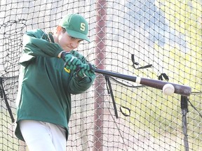 Ryan Barton works on his hitting in the batting cage at the Terry Fox Sports Complex on Wednesday evening.
GINO DONATO/THE SUDBURY STAR