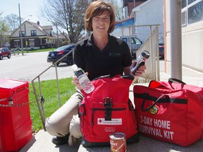 Dianne Marshall of Oxford EMS shows off an example of three-day survival kit that every residence should own. (HEATHER RIVERS/WOODSTOCK SENTINEL-REVIEW)