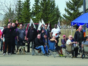 Guards at the Fort Saskatchewan Correctional Centre band together for Day 2 of the wildcat strike on Saturday. The five-day strike came to an end on Tuesday, with a deal made between the province and the Alberta Union of Provincial Workers. Photo by Ben Proulx.