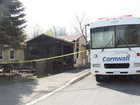 The Cornwall Emergency Command Vehicle sits beside the rental unit of the Royal Oaks housing complex off 12th Street East which caught fire Wednesday evening. There were no injuries. Fire officials are investigating, Thursday, May 2, 2013 in Cornwall, Ont.
GREG PEERENBOOM/CORNWALL STANDARD-FREEHOLDER/QMI AGENCY