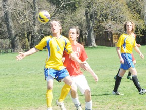 SARAH DOKTOR Simcoe Reformer
Delhi's Henry Boldt jumps to head butt the ball alongside Waterford's Austin Logan during a boys' soccer game at Waterford District High School on Thursday.