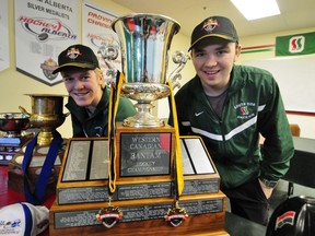 Southside Athletic Club (SSAC) star forward Tyler Benson, left, and team captain David Quenneville pose alongside the 2013 Western Canadian AAA Bantam Championship trophy at the SSAC Clubhouse, 4250 - 91A st., on April 15, 2013. TREVOR ROBB Edmonton Examiner