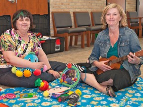 Sharon Brooks (left), executive director of Kids Can Fly, and Jane Flinders, who leads The Parachute Program -- Transitioning to Parenthood, are marking the first anniversary of the program, held Wednesdays at St. Andrew's United Church. (BRIAN THOMPSON, The Expositor)