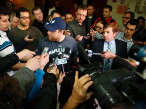 Phil Kessel talks to a throng of reporters on Thursday at Boston University where the Maple Leafs were practising. (Michael Peake, Toronto Sun)
