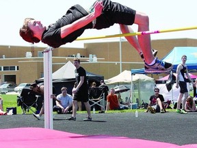 Josh Hill of Northwestern places second in the junior boys high jump at a high school track and field meet Wednesday in Strathroy. Hill cleared 1.80 metres to break the Northwestern school record of 1.65m set by Kyle Groenestege back in 2005. 
Photo by Marcie Stears