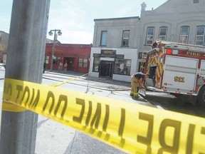 Stratford firefighters were on the scene within minutes of a smokey blaze inside Karma Restaurant and Pizzeria in downtown Stratford Thursday. SCOTT WISHART The Beacon Herald