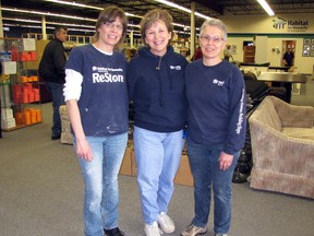 The new Habitat for Humanity ReStore in Sarnia has been open a week on London Line in the former United Furniture Warehouse. From left are volunteer and home recipient Anne Strangway, Habitat executive director Sarah Reaume and ReStore manager Chris Hill. (CATHY DOBSON/THE OBSERVER/QMI AGENCY)