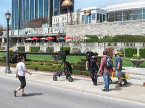 A film crew packs up after shooting what appeared to be the first episode of The Amazing Race Canada along the Niagara Parkway Friday morning. PHOTO: John Law / The Review