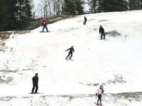 From the top, Lyndon Hensrud, Donovan Bittern, Megan Scheibler, Claire Hensrud, Mark Scheibler and Sadie McCallum get in one last run at Mount Evergreen on Wednesday, May 1, becoming the first people to ski the Kenora hill in May.
GRACE PROTOPAPAS/Daily Miner and News