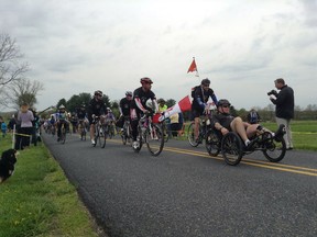 M.Cpl. Brian Preece, of the Aerospace and Telecommunications Engineering Support Squadron at 8 Wing/CFB Trenton, leads the American Portfolios team through the final parade into Gettysburg, Penn. during this year's World T.E.A.M. Sports‘ Face of America, a two-day and 110-mile cycling event that brings together military riders with disabilities and riders who are able-bodied and took place April 26 to 28.
