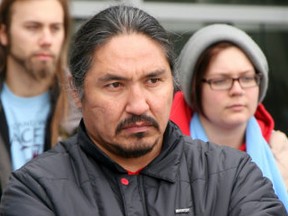 ACFN Chief Allan Adam of the Athabasca Chipewyan First Nation looks on as protesters at MacDonald Island Park rally outside hearings for Shell's Jackpine Mine expansion in 2012. TODAY FILE PHOTO.