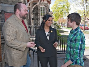 Brant NDP federal candidate of record Marc Laferriere and Rathika Sitsabaiesan, the MP for Scarborough-Rouge River, speak with Ryan Jamula of Brantford, president of the provincial NDP riding association.  Sitsabaiesan, the youngest MP in Ontario, was among a number of speakers at the 3rd annual Brantford Youth Leadership Conference held Friday at Counterpoint Church on Pearl Street in Brantford. (BRIAN THOMPSON Brantford Expositor)