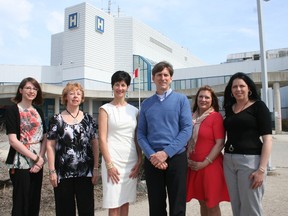 Janna Cook, third from left, will be replacing Jean-Pierre Nadon as the executive director of the Timmins and District Hospital Foundation. The announcement was made this week. Those attending the announcement were, from left, foundation administrative assistant Marie-Josée Chartrand, chairwoman Anne Hannah, Cook, Nadon, and staffers Judy Bolduc and Andrea Dixon.