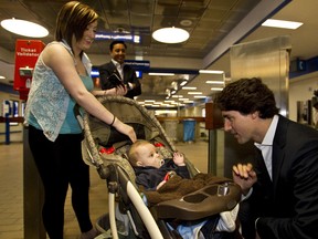 Acacia Henderson and her 7 months-old son Bentley, from Gibbons, Alta., met Liberal Party of Canada leader Justin Trudeau at Churchill Station in Edmonton, Alta., on Friday, May 3, 2013. (IAN KUCERAK/Edmonton Sun/QMI Agency)