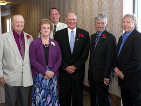 Three inductees and family members of three other inductees gather before the Kingston & District Sports Hall of Fame annual induction at the Ambassador Conference Resort on Friday night. From left, Bubs Van Hooser, Norma Abrams (representing her son Barry Ellerbeck), Rob Besselink (representing his brother Gerry Besselink), John McFarlane, Bob Elliott and Joe Dunphy (representing his brother-in-law Mark Leduc). (Ian MacAlpine/The Whig-Standard)
